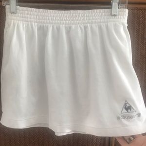 Le Coqsportif white medium tennis skirt.